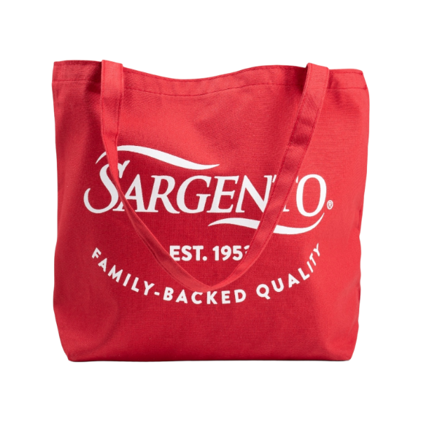 Angled view of red canvas tote bag with large Sargento logo and “Est. 1953” text, showing structured shape, side panel depth, and durable shoulder straps