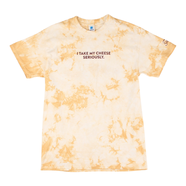 Light tan tie-dye T-shirt with "I Take My Cheese Seriously." text across the chest and subtle Sargento branding on the sleeve.
