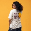 Sargento Cheddar Lineup Tee worn from the back showing oversized cheddar cheese graphic