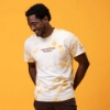 Sargento Cheese With Standards Tee worn from the front showing “I Take My Cheese Seriously” design and Sargento sleeve logo