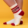 Close-up of Sargento Signature Socks showing striped cuff, Sargento logo, and red heel and toe