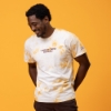 Sargento Cheese With Standards Tee worn from the front showing “I Take My Cheese Seriously” design and Sargento sleeve logo