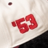 Close-up of The Heritage Snapback showing embroidered '53 detail on the side