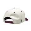 Back angle view of "The Heritage Snapback", showing a burgundy snap closure and contrast brim edge.